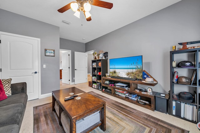 living room with carpet flooring and ceiling fan