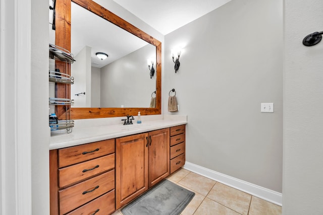 bathroom with vanity with extensive cabinet space and tile flooring