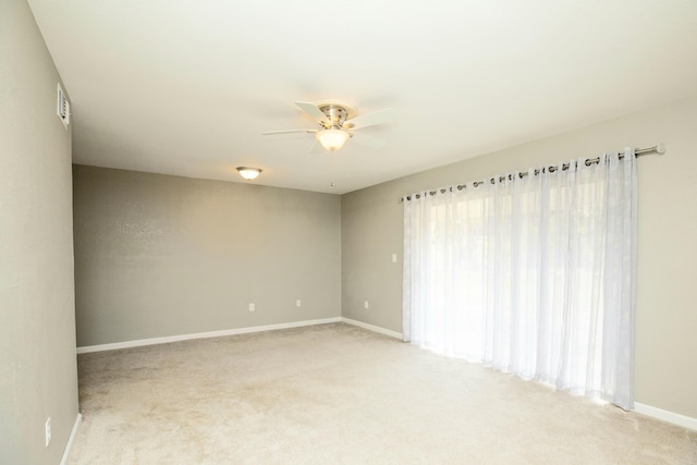 401 Marshall Ct NW Unit 2, Fort Walton Beach, FL 32548 - unfurnished room featuring ceiling fan, light carpet, and baseboards