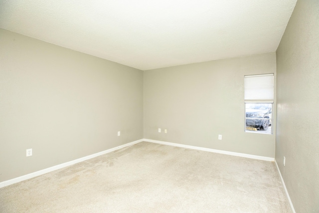 401 Marshall Ct NW Unit 2, Fort Walton Beach, FL 32548 - unfurnished room with light colored carpet and baseboards