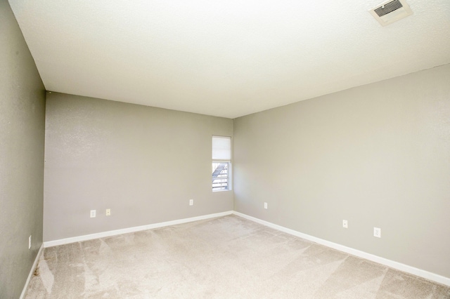 401 Marshall Ct NW Unit 2, Fort Walton Beach, FL 32548 - empty room with light carpet and baseboards