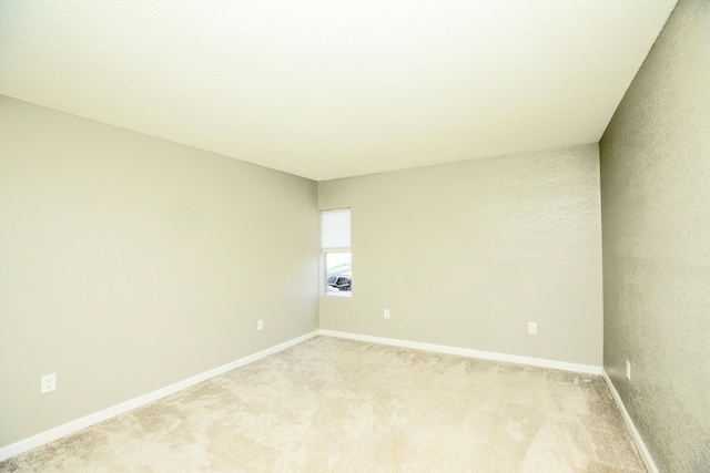 401 Marshall Ct NW Unit 2, Fort Walton Beach, FL 32548 - unfurnished room with light carpet and baseboards