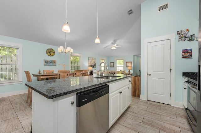 kitchen with sink, dishwasher, white cabinetry, hanging light fixtures, and a kitchen island with sink