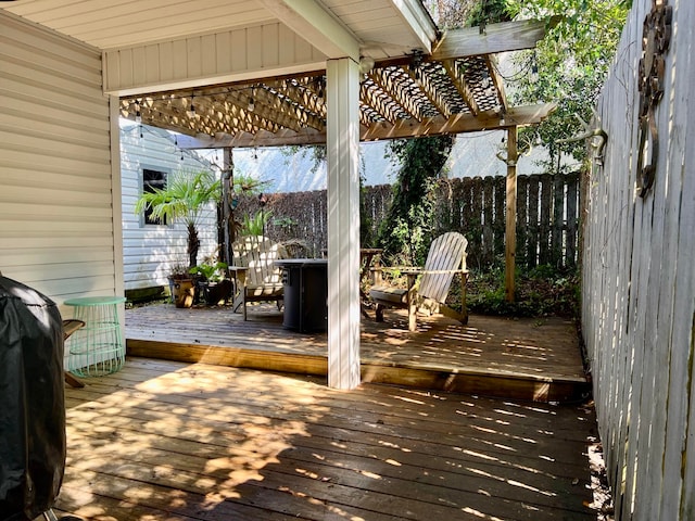 wooden terrace featuring a pergola