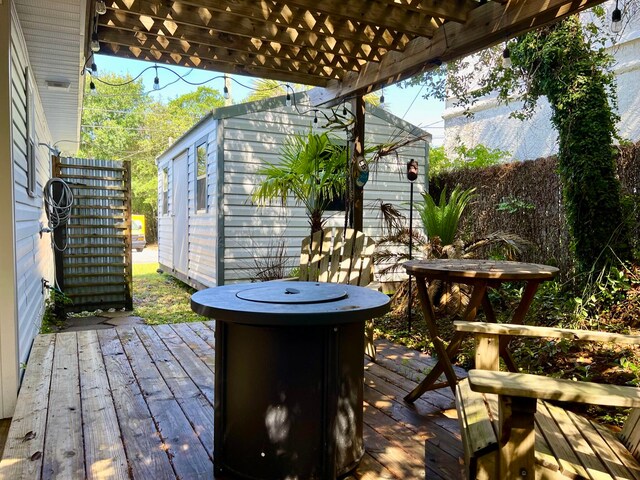 wooden terrace with a pergola