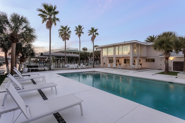 pool with a patio