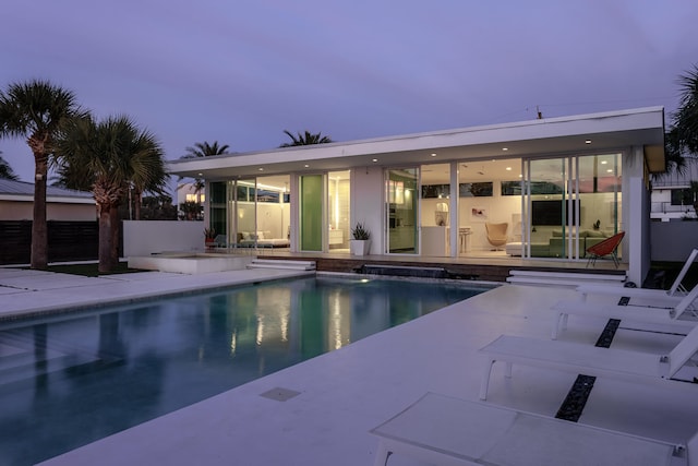 outdoor pool with a patio