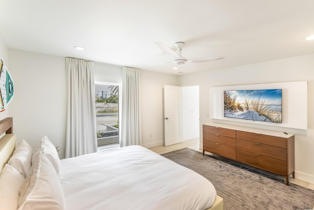 bedroom featuring light wood-style flooring, baseboards, a ceiling fan, and recessed lighting