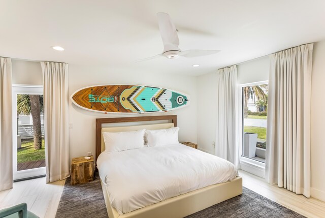 bedroom with access to outside, ceiling fan, and recessed lighting