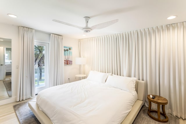 bedroom featuring access to exterior, ceiling fan, wood finished floors, and recessed lighting