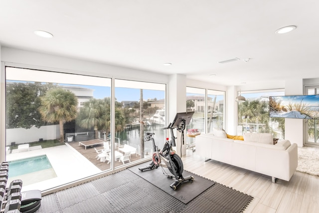 exercise area featuring visible vents and recessed lighting