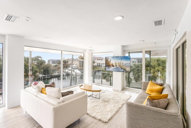 sunroom featuring visible vents