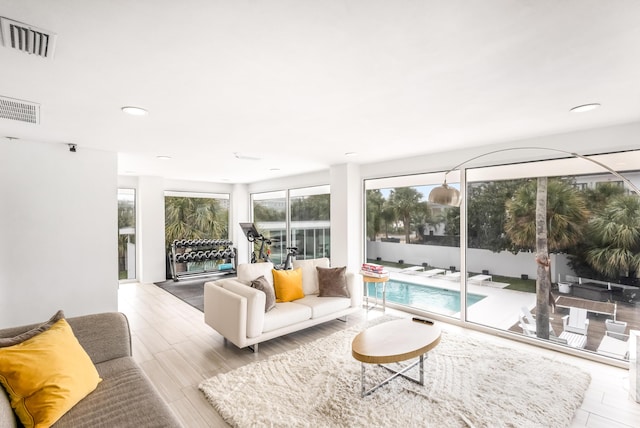 sunroom featuring visible vents