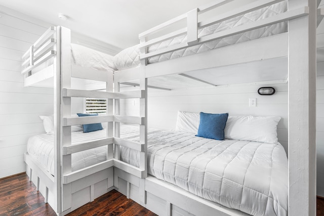 bedroom with wood-type flooring