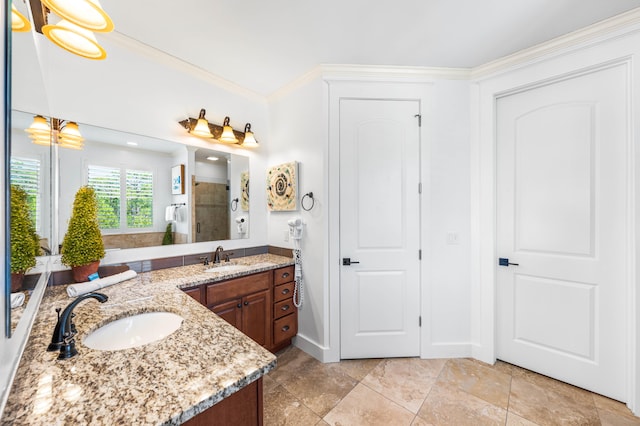 bathroom featuring vanity, crown molding, and tile flooring