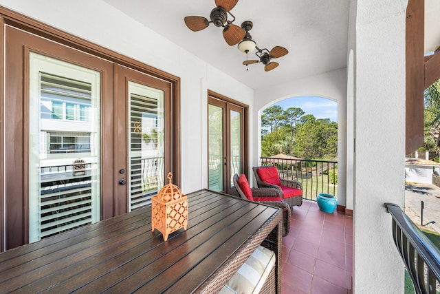 balcony featuring french doors and ceiling fan