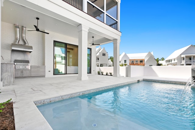 view of pool featuring a patio, area for grilling, ceiling fan, and grilling area