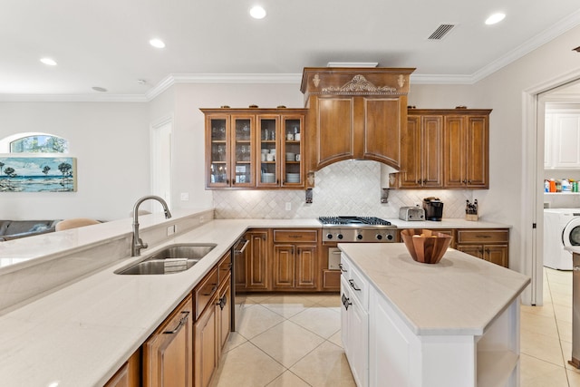 kitchen with sink, light tile flooring, backsplash, crown molding, and ventilation hood