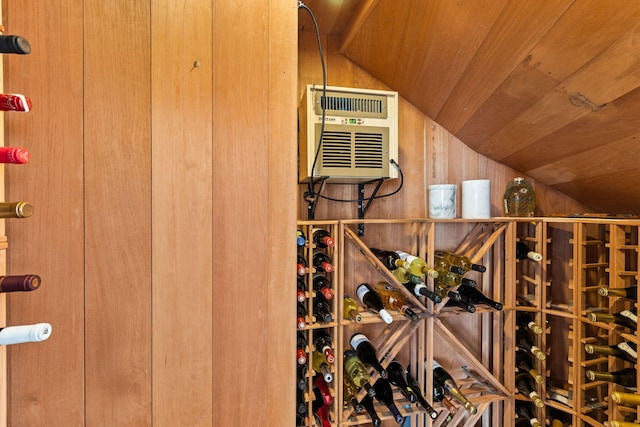 wine room featuring wood ceiling and lofted ceiling