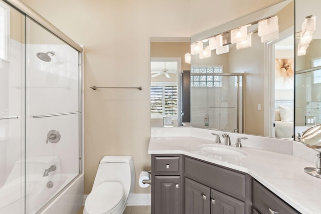 full bathroom with ceiling fan, large vanity, crown molding, toilet, and shower / bath combination with glass door