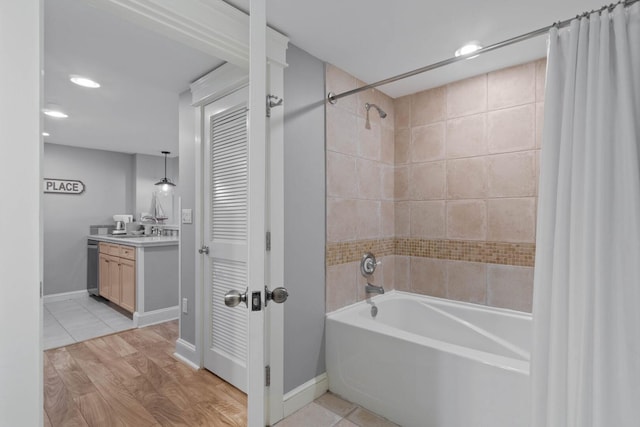 bathroom with hardwood / wood-style flooring and vanity