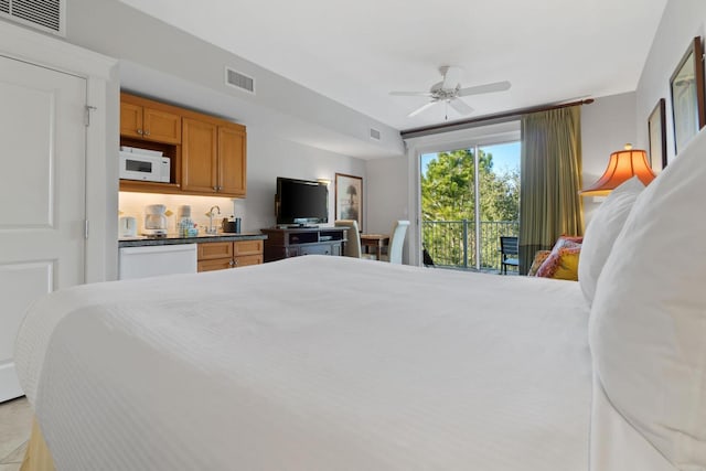 bedroom featuring ceiling fan and access to exterior