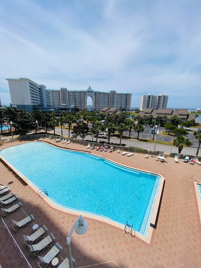 view of swimming pool featuring a patio