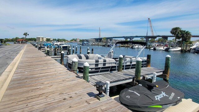 dock area with a water view