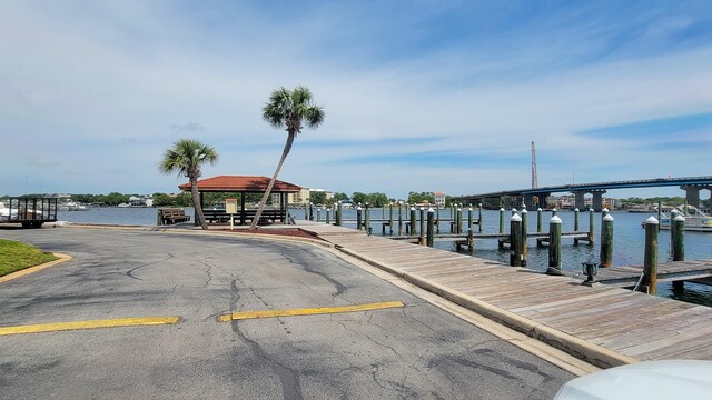 dock area with a water view