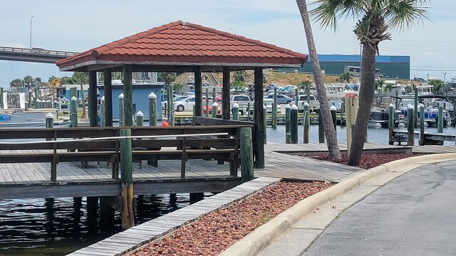 dock area with a water view