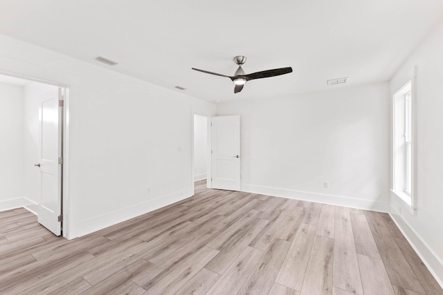 unfurnished room featuring ceiling fan and light hardwood / wood-style floors