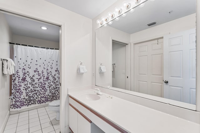 bathroom featuring tile patterned flooring, toilet, vanity, and a shower with curtain