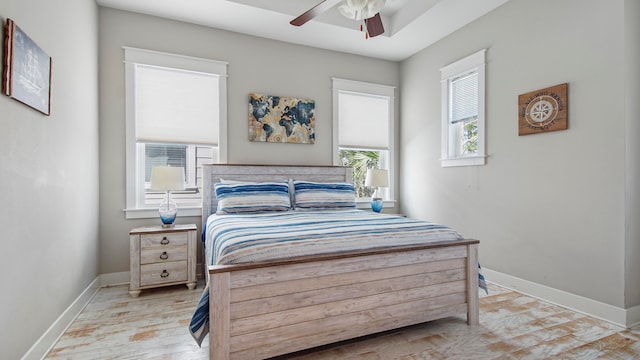 bedroom featuring ceiling fan and light wood-type flooring