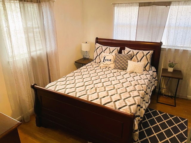 bedroom featuring hardwood / wood-style floors