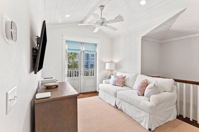 carpeted living room featuring ornamental molding, lofted ceiling, ceiling fan, and wood ceiling