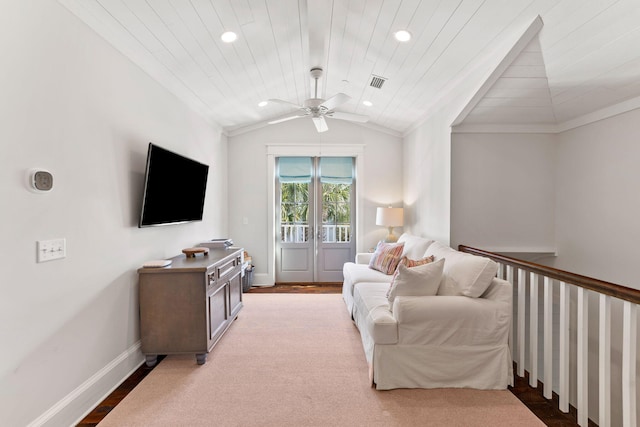 sitting room featuring light hardwood / wood-style flooring, ceiling fan, vaulted ceiling, crown molding, and wood ceiling