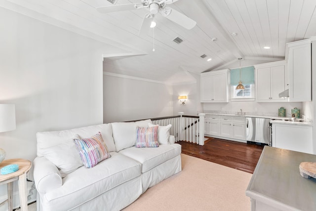 carpeted living room featuring ceiling fan