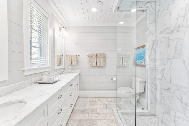 bathroom featuring dual bowl vanity, toilet, tile flooring, and a shower with door