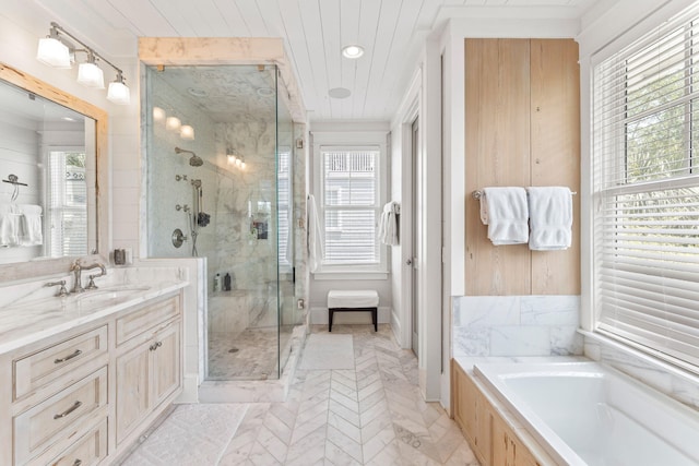 bathroom featuring tile flooring, vanity, and plus walk in shower