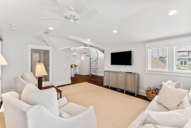 living room with ceiling fan, dark hardwood / wood-style flooring, and lofted ceiling