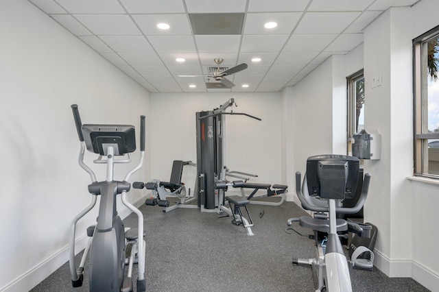 workout room featuring a paneled ceiling