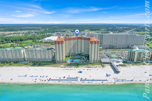 aerial view featuring a water view and a beach view