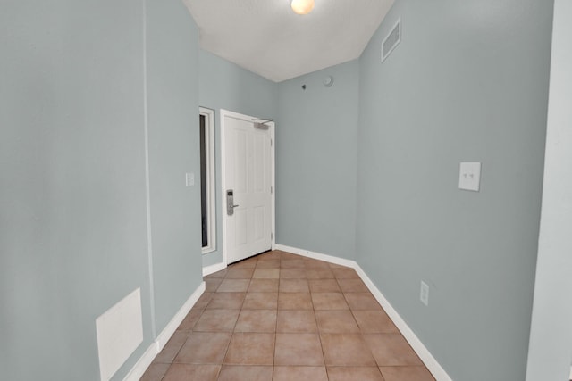 view of tiled spare room