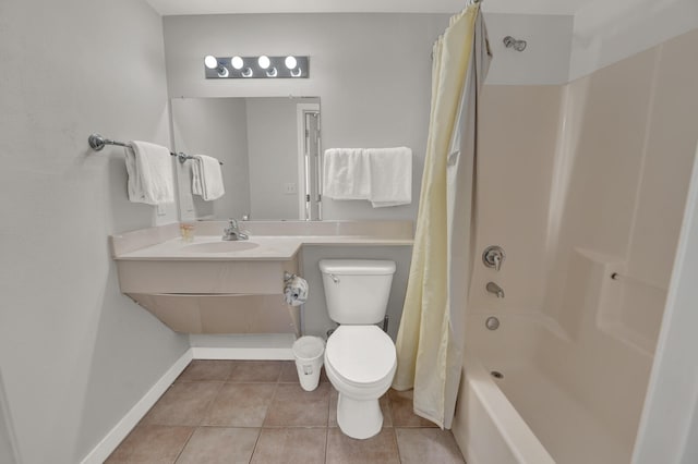 full bathroom with shower / bath combo, toilet, tile flooring, and vanity with extensive cabinet space