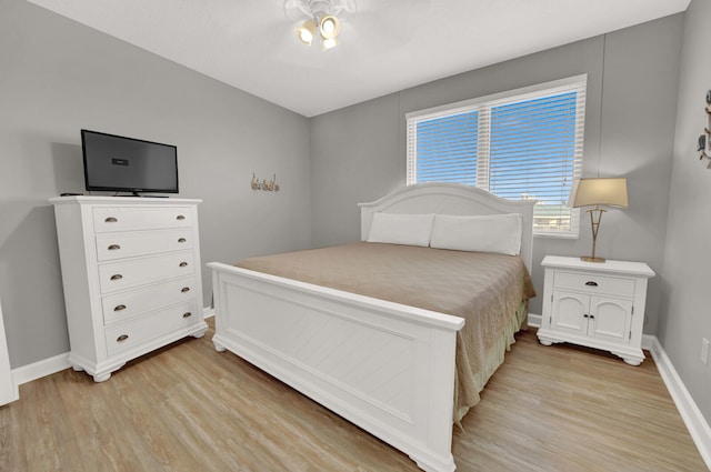 bedroom with light hardwood / wood-style floors