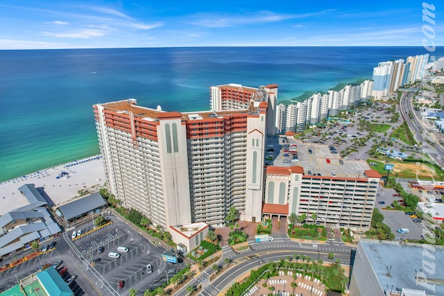 aerial view featuring a water view and a view of the beach