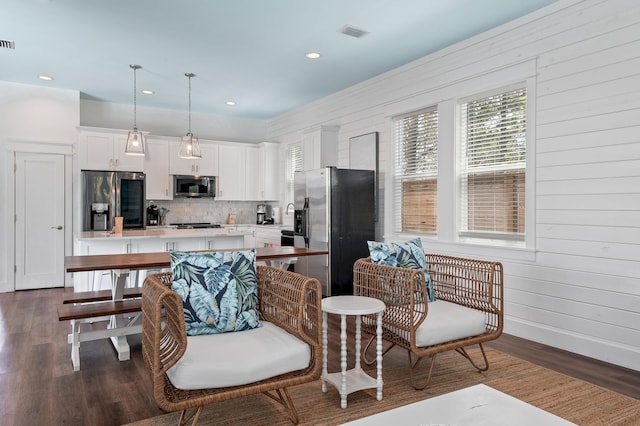 interior space with dark hardwood / wood-style floors