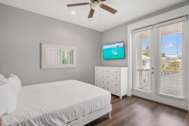 bedroom with access to outside, ceiling fan, french doors, and dark hardwood / wood-style floors