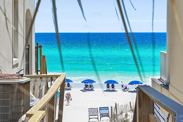 property view of water featuring a beach view