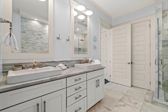 bathroom featuring vanity, backsplash, crown molding, tile walls, and walk in shower